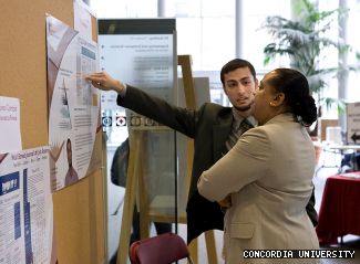 Co-op student Shihadeh Anani explains his research to Nadine Benjamin, senior coordinator of the program, during the Co-op Student Showcase on April 8.